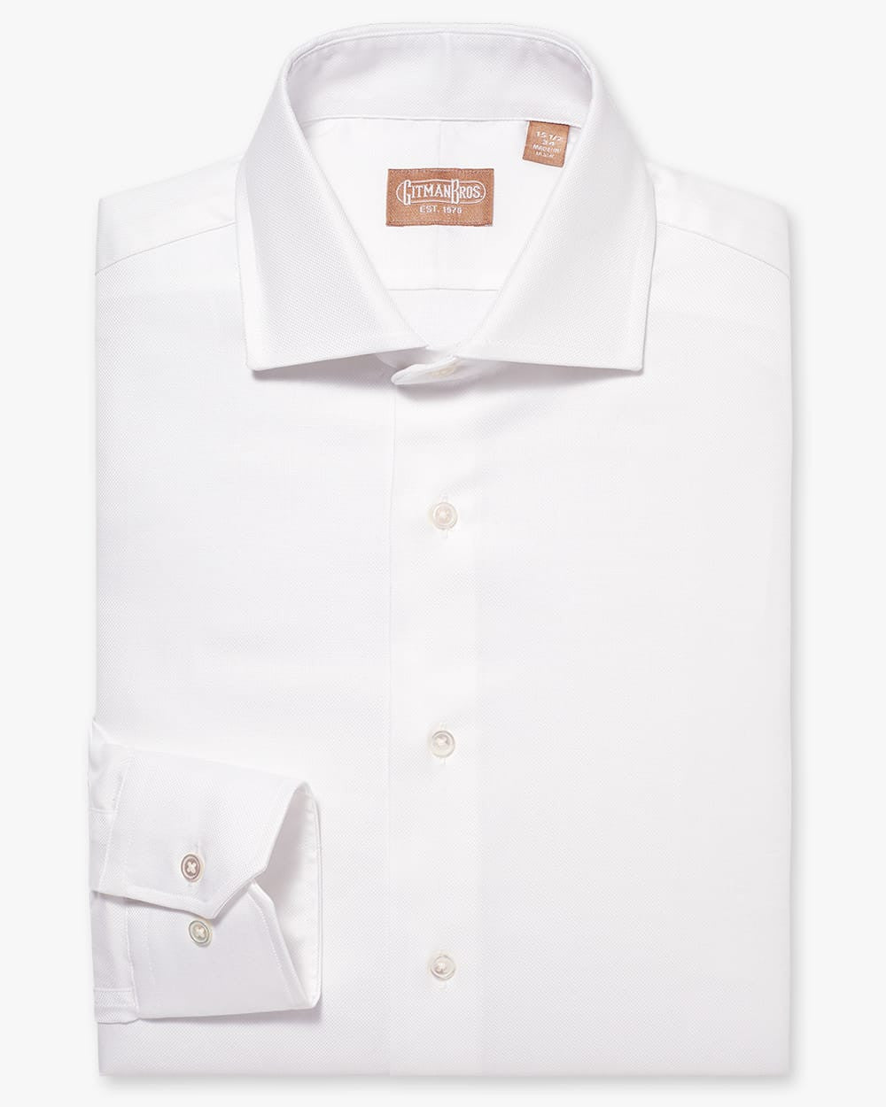 Folded button down shirt with widespread collar and white fabric