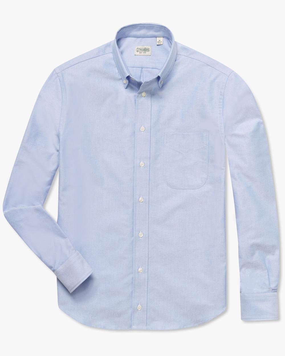 Long sleeve button down shirt with white buttons and blue oxford cloth fabric
