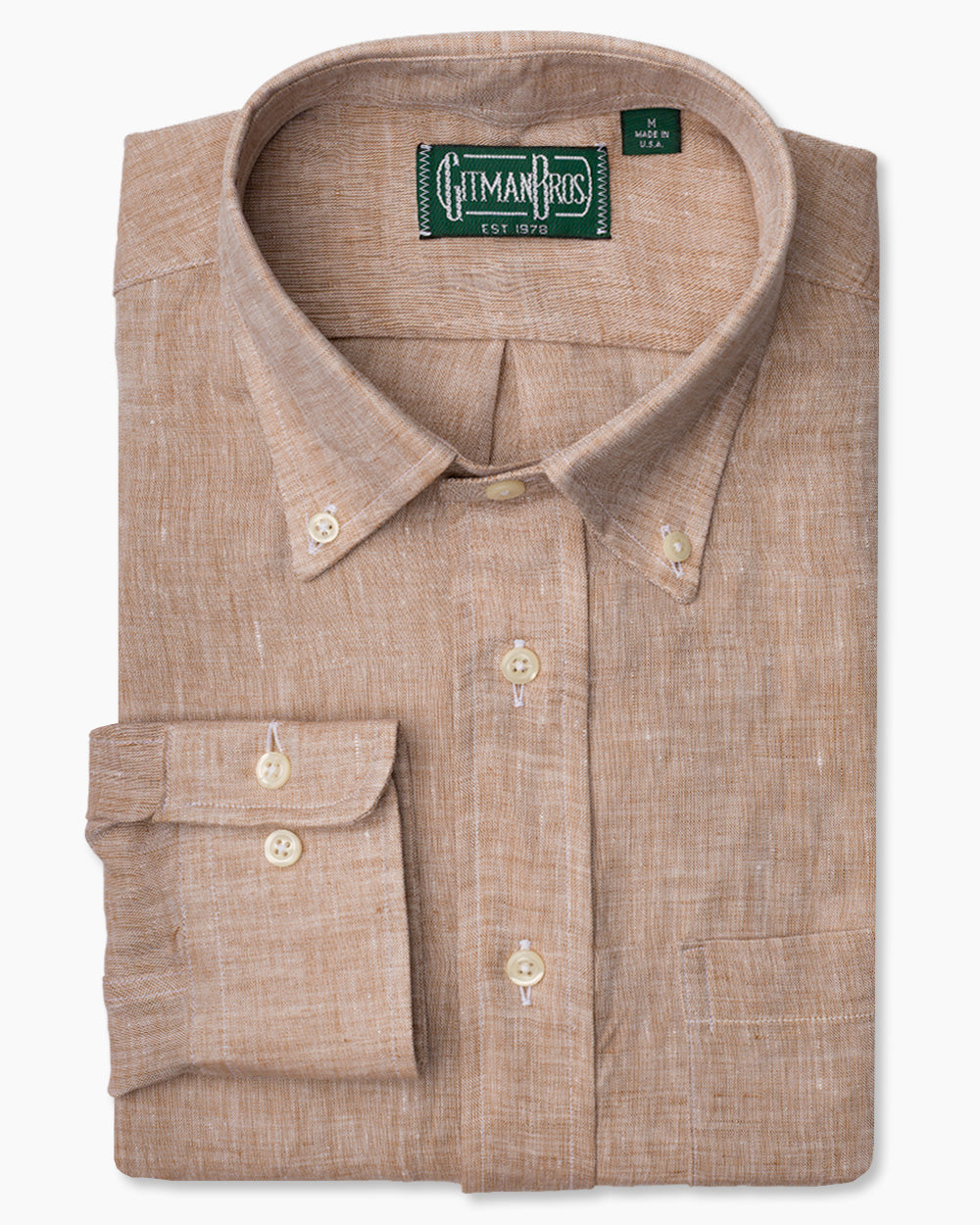 The Tan Canclini Linen shirt with a button down collar and white buttons on a stitched placket.