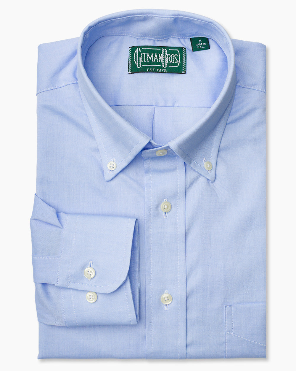 The Blue Zephyr Oxford shirt with a button down collar and white buttons on a stitched placket.