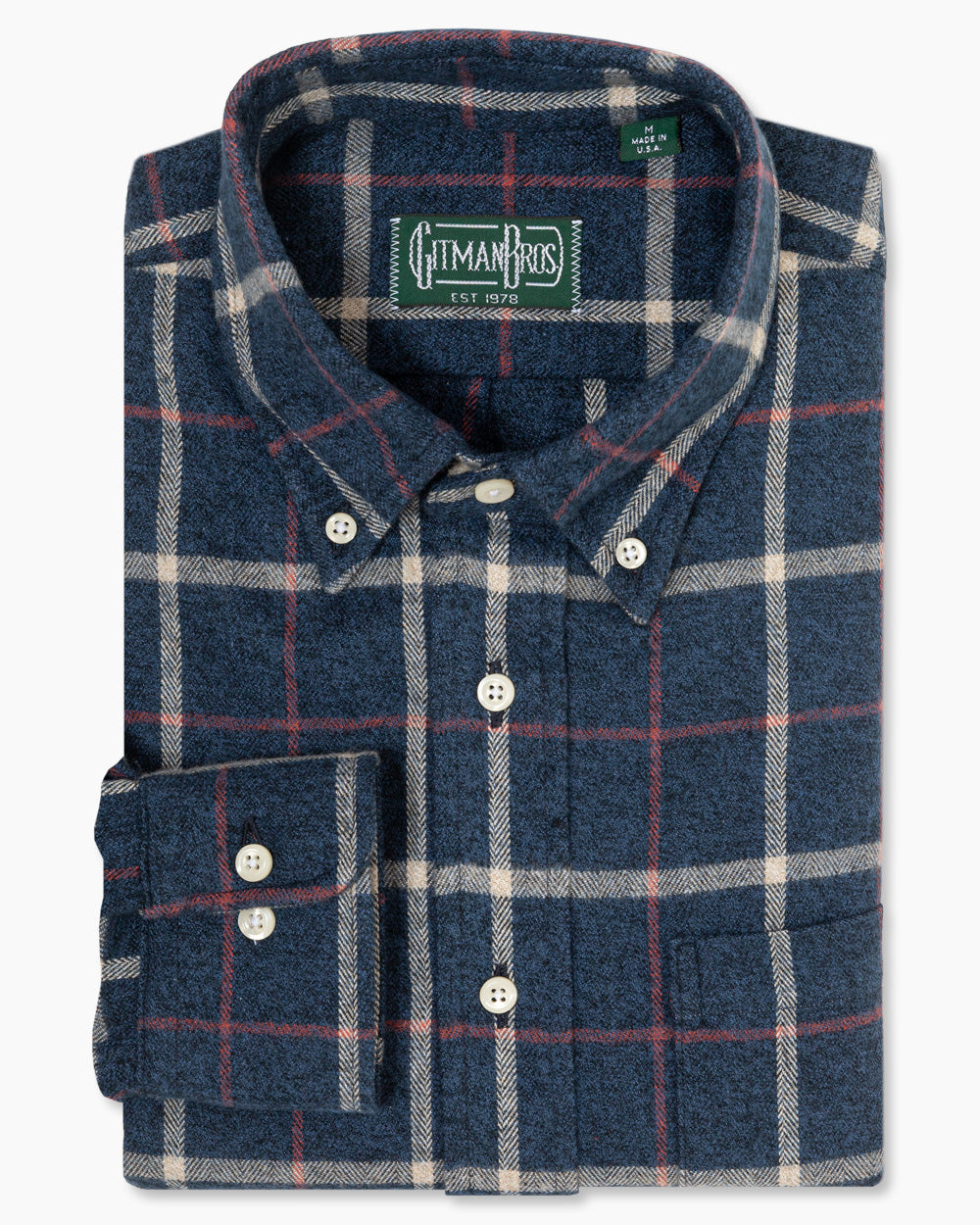 Blue Checked Flannel sport shirt in soft cotton features a classic check pattern, button-down collar, lined cuffs, and chest pocket for versatile menswear styling.