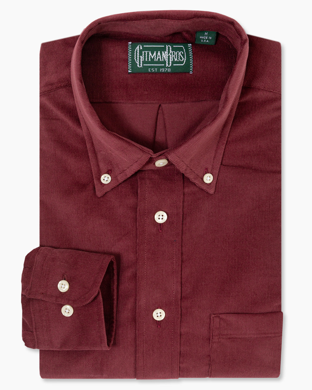 Burgundy Corduroy Flannel sport shirt features soft textured cotton, a button-down collar, lined cuffs, chest pocket, and classic construction for versatile menswear styling.