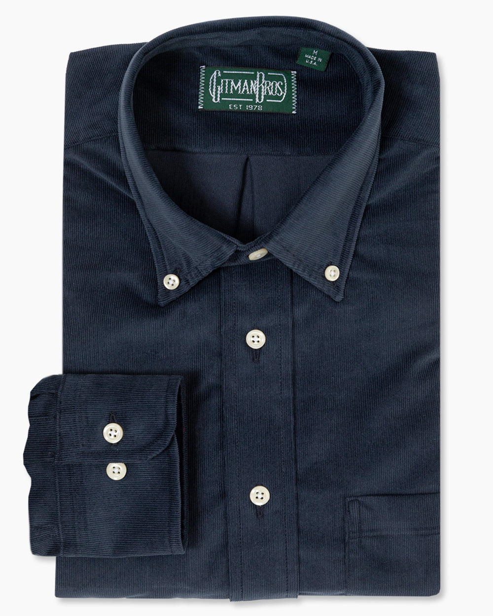 Navy Corduroy Flannel sport shirt features soft textured cotton, a button-down collar, lined cuffs, chest pocket, and classic construction for versatile menswear styling.